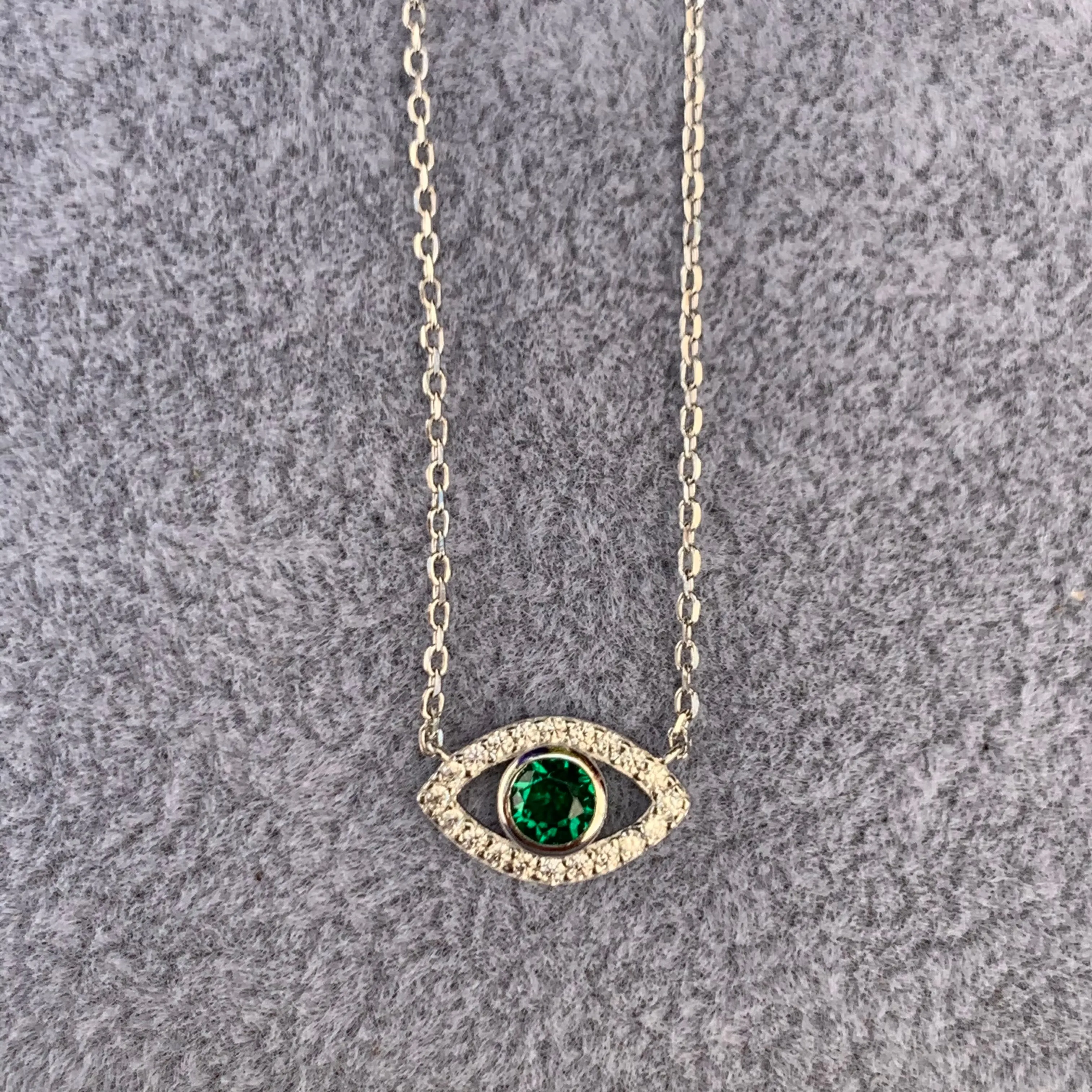 “Ojos” Sterling silver green eye necklace